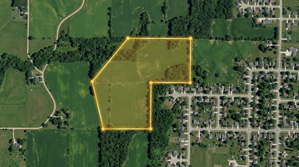 Satellite map with a polygon boundary drawn over farmland